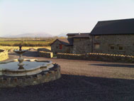 View from the fountain courtyard to the cottage