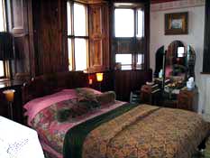 The stunning bedroom in the Telegraph Suite